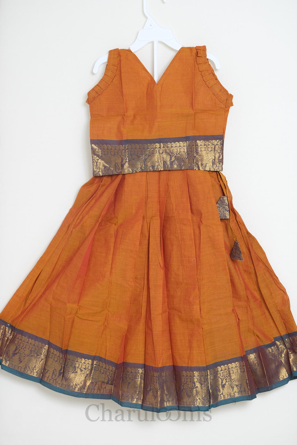 Rust Orange Pattu Pavada with Temple Zari Border