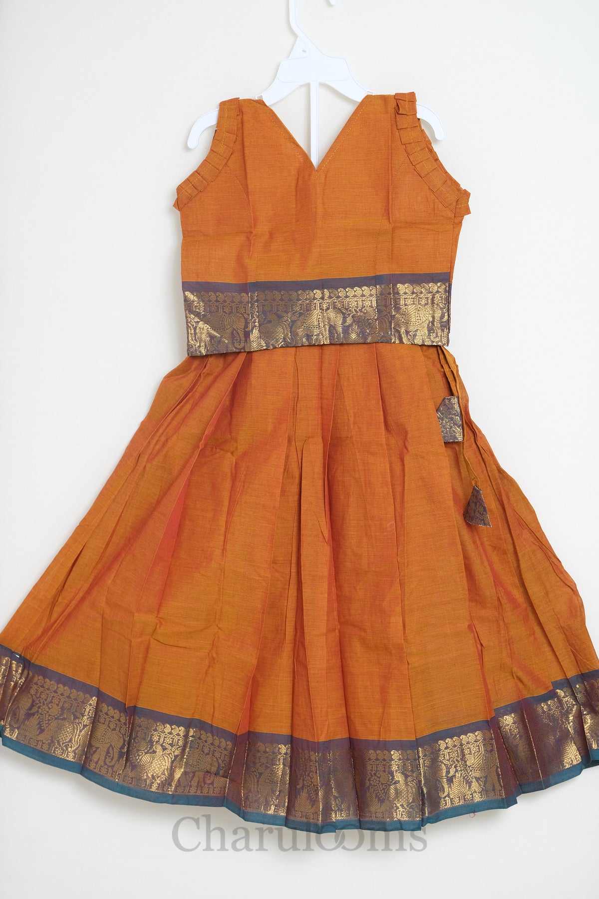 Rust Orange Pattu Pavada with Temple Zari Border