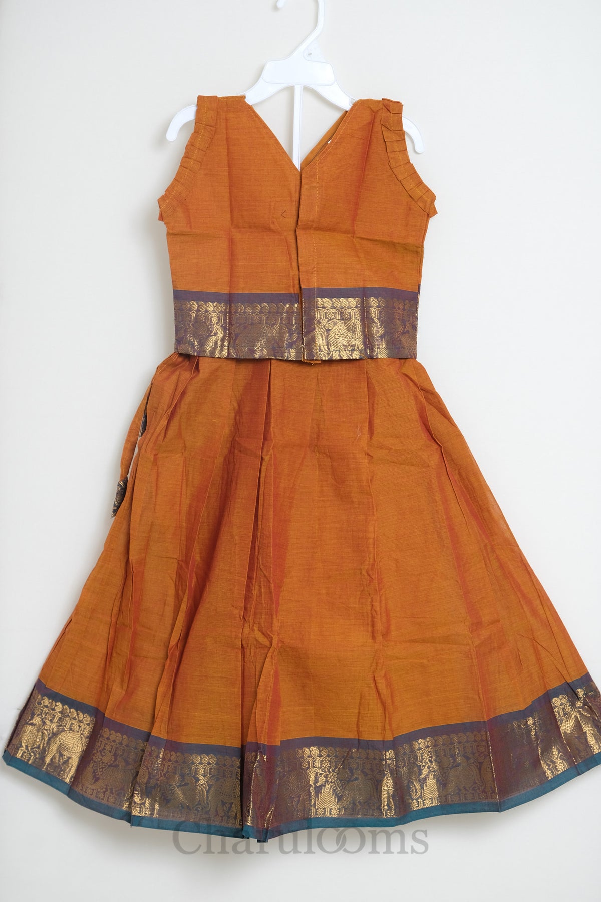 Rust Orange Pattu Pavada with Temple Zari Border