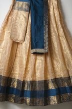 Premium Tissue Silk Dhavani Set – Champagne Gold with Checked Pattern & Teal Blue Zari Border